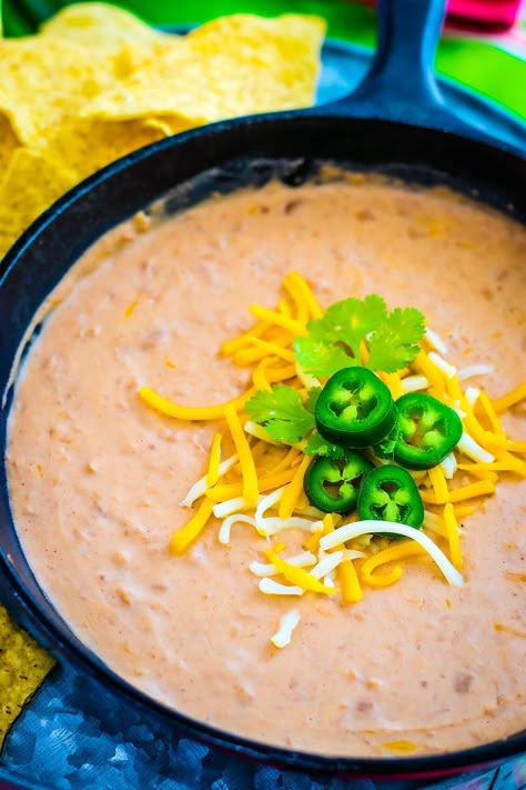 Get creamy Restaurant Style Refried Beans by adding a few ingredients to canned refried beans! These easy refried beans are the perfect side dish, great on tostadas, Mexican Pizzas, tacos or burritos, and even a tasty dip!  #refriedbeans #mexicanfood #easyrefriedbeans #restaurantstylerefriedbeans Restaurant Bean Dip, Restaurant Refried Beans, Restaurant Style Refried Beans Recipe, Mexican Refried Beans Recipe, Best Refried Beans Recipe, Restaurant Style Refried Beans, Refried Beans Recipe Easy, Mexican Beans Recipe, Mom Snacks