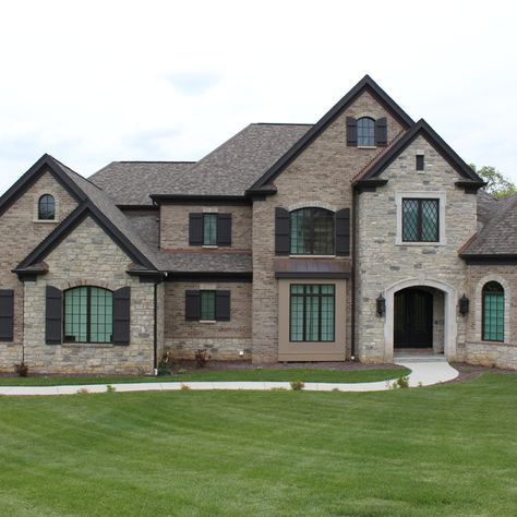 James Hardie Khaki Brown lap siding was used on the sides and back of this beautiful new construction home. Timber Bark soffit and fascia helped make this house really stand out. Brown Soffit And Fascia, Soffit And Fascia, Hardie Board, James Hardie Siding, Hardie Siding, James Hardie, Lap Siding, Door Replacement, Manufactured Stone