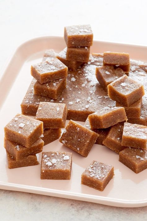 How To Make Vegan Caramels | Date caramels are one of those culinary magic tricks that you can't even believe works until you try it. You pulse whole dates with a few other ingredients, press them into a pan, and top with a bit of flaky salt. Just 30 minutes later you can cut out soft, chewy caramels that are free from added sugar (not to be confused with the loads of sugars naturally occurring in dates) and high in dietary fiber. Coconut Dessert, Vegan Caramel, Vegan Candies, Date Recipes, Brownie Desserts, Sugar Cubes, Oreo Dessert, Caramel Recipes, Vegan Sweets