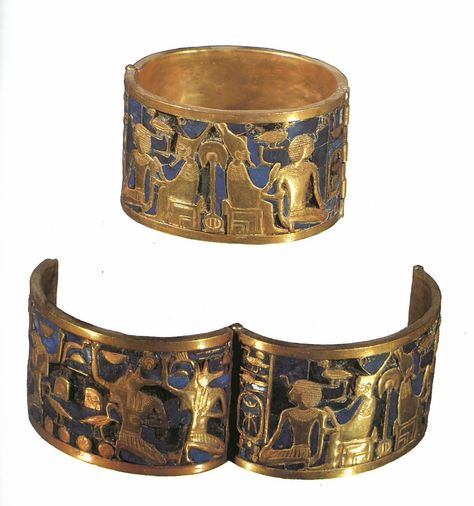 This piece is a bracelette that belonged to Queen Ahhotep, it is gold over a lapis lazuli background and was found in her tomb along with other treasures. This bracelet depicts the god Geb - representing the earth - wearing both crowns of Egypt and giving his blessings to the kneeling king. This piece is found in the Egyptian Museum, Cairo. Egypt Museum, Egypt Jewelry, Ancient Egyptian Jewelry, Ancient Jewels, Egyptian Museum, Bijoux Art Nouveau, Ancient Jewellery, Egyptian Artifacts, Style Africain