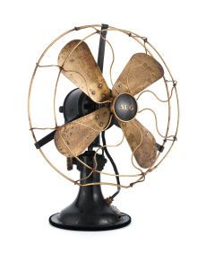 PETER BEHRENS FOR AEG. A Metal and Cast Iron Table Fan, circa 1908. Manufacturer's label on base. 16-1/2 inches... Ge Logo, Antique Ceiling Fans, Cool Fan, Antique Fans, Vintage Fans, Desk Fan, Antique Desk, Electric Fan, Iron Table