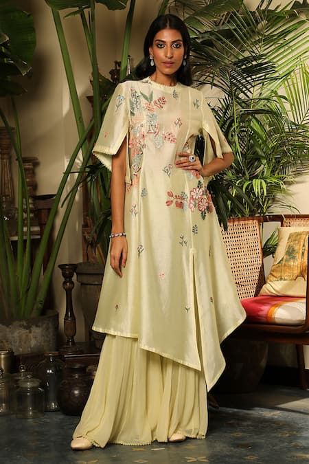 Buy Yellow Chanderi Embroidery Garden Round Azra Tunic For Women by Sahil Kochhar Online at Aza Fashions. Tunic Dress Outfit, Exhibitions Ideas, Plazo Outfits, Tunic Dresses Outfit, Heavy Kurti, Sahil Kochhar, Embroidery Garden, Coord Sets, Net Embroidery