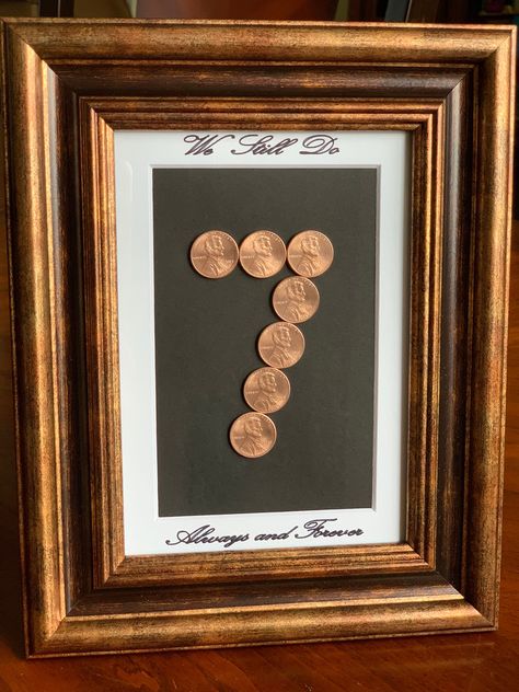 Here I have, made to order, a beautiful keepsake. 7 copper penny coins adorn these frames as a momento of a seventh anniversary.  NOTE:  this is for the framed gift with pennies in the straight line configuration.  If you would like the coins in the 7 configuration, please order from this listing: https://www.etsy.com/listing/504843847/copper-coin-7-year-anniversary-gift?click_key=a9c465db802e9fe8e496e6621d61dee195413bb6%3A504843847&click_sum=a11c65d2&ref=shop_home_active_3 You can have pennies Coins Art Ideas, Bae Gift, Penny Picture, Couples Night, Anniversary Note, 7 Year Anniversary Gift, Coin Crafts, Coin Frame, Anniversary Crafts