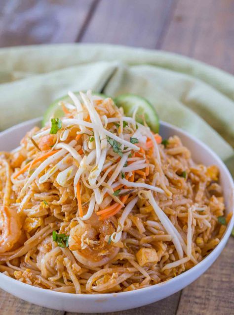 Easy Pad Thai with Shrimp, tofu, rice noodles, and peanuts in a quick sauce made from fish sauce, sugar, crushed red pepper and vinegar in less than 30 minutes. Skip the delivery! Pad Thai Chicken, Shrimp Tofu, Tofu Rice, Wok Recipes, Dinner Then Dessert, Thai Peanut Chicken, Chicken Pad Thai, Noodles Recipes, Pad Thai Noodles