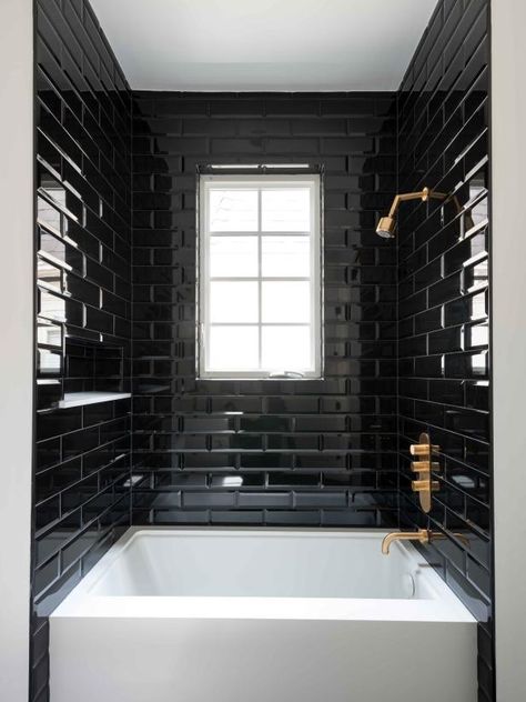 Paint It Black: The Glory of Dark Interiors | HGTV White Tiled Bathroom, Black Tile Bathrooms, Black Subway Tiles, Tiled Bathroom, Black And White Bathroom, Subway Tiles Bathroom, Bilik Air, Dark Bathrooms, Black Tile