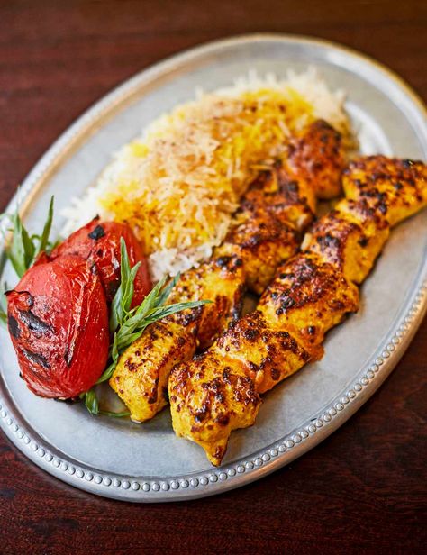 Jujeh Kabab Recipe Reflecting the food of Tehran's hole-in-the-wall kabab houses, Berenjak restaurant's convivial cooking is ideal to recreate at home. Try this chicken kebab as part of a meze feast Jujeh Kabob Recipe, Jujeh Kabob, Meze Recipes, Persian Food Iranian Cuisine, Arabisk Mad, Persian Chicken, Meze Platter, Yalda Night, Chicken Kebab Recipe