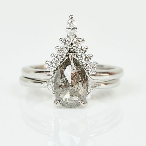 This gorgeous handcrafted engagement ring features a pear shape grey salt and pepper centre diamond surrounded by a pair of matching brilliant diamonds set in platinum. This ring is perfect for the modern bride or as a stunning right-hand statement ring. All of our diamonds are ethically sourced and produced. Multi Finger Rings, Grey Diamond Engagement Ring, Engagement Ring Alternative, Diamond Alternative Engagement Ring, Handcrafted Engagement Ring, Alternative Bride, Bespoke Rings, Ring Hand, Local Jewelry