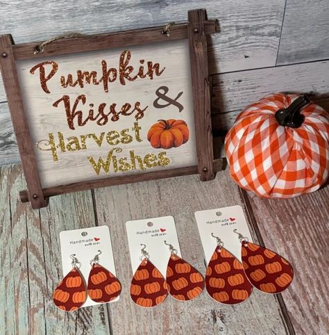 🍂 Celebrate fall in style with our handmade pumpkin earrings! 🎃 Perfect for adding a touch of autumn to your outfit. Pair them with your favorite cozy décor like this adorable sign and plush pumpkin for the ultimate harvest vibes. ✨ Swipe to shop these unique, seasonal accessories and bring some "Pumpkin Kisses & Harvest Wishes" into your wardrobe! 🍁 #FallFashion #HandmadeEarrings #PumpkinSeason #HarvestVibes #CozyDecor #FallAccessories #AutumnStyle #PumpkinKisses #EtsyShop #SeasonalJewelry... Leather Pumpkin, Thanksgiving Earrings, Earrings Halloween, Faux Leather Earrings, Pumpkin Earrings, Pumpkin Seasoning, Fall Earrings, Cozy Decor, Fall Accessories