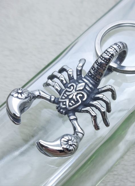 Large scorpion keychain. Mens keyring. Stunning life size scorpion. Great keychain, bag charm or fashion accessory. Gift for men bikers christmas.
#scorpionkeychain #scorpionkeyring #mensmetalkeyrings #strongkeyfobs #keychainsformen #unusualkeyrings #snowstarpendants Chrome Scorpion, Scorpion Metal Art, Scorpion Jewelry, Crystal Scorpion, Scorpion Keychain, Mens Keychains, Scorpion, Life Size, Key Fobs