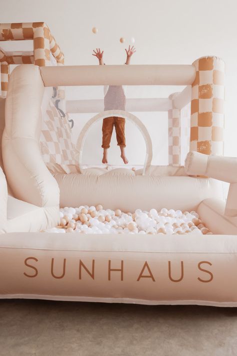 JumpHaus bounce house inflatable water slide by SUNHAUS Co Bounce House First Birthday, Neutral Bounce House, Bounce House Birthday Party Ideas, Mini Bounce House, Birthday Bounce House, Bounce House Business, Modern Bounce House, Indoor Bounce House, Water Bounce House