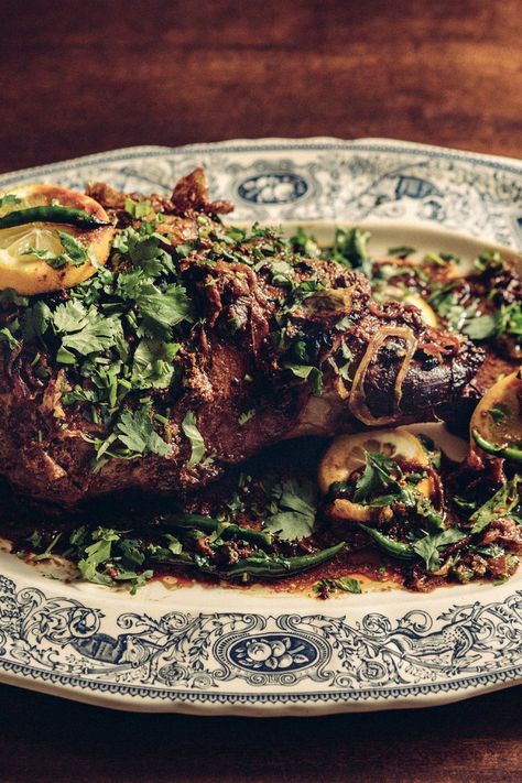 This recipe for a whole roasted leg of lamb comes from the cookbook author Sameen Rushdie, who wrote "Indian Cookery," the classic published in Great Britain in 1988 On Sundays, after a matinee at the Metro Cub Club in Bombay, the Rushdie family often sat down to a special lunch of roast lamb In this version, the yogurt marinade turns into a rich sauce as it mixes with the braising liquid in the oven Indian Roast Leg Of Lamb, Nytimes Cooking, Braising Liquid, Butterflied Leg Of Lamb, Roasted Leg Of Lamb, Roast Leg Of Lamb, Julia Childs, Yogurt Marinade, Goat Recipes