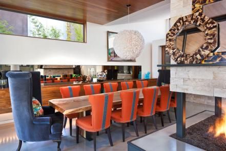 A smooth wood ceiling and rough hewn dining table add natural warmth to this contemporary dining space. Bright orange upholstered chairs serve as the exclamation point in this room's design. Orange Dining Room, Orange Pictures, Orange Dining Chairs, Orange Chair, Open Dining Room, Exclamation Point, Orange Decor, Contemporary Dining Room, Cozy Kitchen