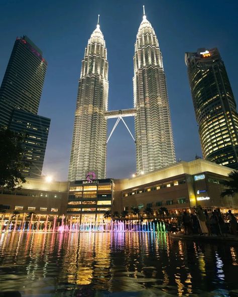 As a child, I would watch films featuring towering skyscrapers, mesmerized by their grandeur and left wondering what lay within and how it would feel to be there. Cut to the present... Being there felt incredible, and I found myself returning to the same location night after night, captivated by its magnificence. The Petronas Twin Towers is a beautiful establishment that demands your attention, especially during nighttime. And, all the questions that once filled my mind as a child were fi... Petronas Twin Towers, Twin Towers, Night View, Night Time, My Mind, A Child, Skyscraper, Tower, Felt