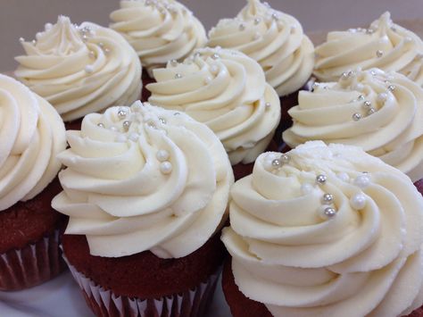 Wedding Cupcakes Red Velvet  with cream cheese and pearls #livaysweetshop #sweetshop #goodies #bakery #barkeynj #livaygoodies #cupcakes #cakesnj #cupcakesnj #cakepops #customcakes #fondantcakes #fondant #cakes #chocolates #plainfieldnj  #weddingcupcakes Red Velvet Cupcakes For Wedding, Wedding Cupcakes With Pearls, Wedding Cupcakes Chocolate, Frosting For Chocolate Cupcakes, White Wedding Cupcakes, Pearl Cupcakes, Cupcake Table, Candy Tables, Bridal Shower Cupcakes