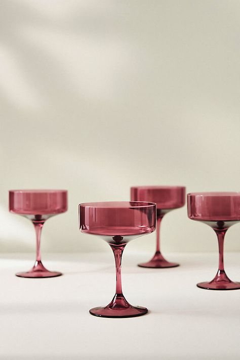 The preferred champagne vessel of 1920s flappers and Old Hollywood starlets, the coupe glass is an alternative to the flute, as well as a vessel for shaken or stirred cocktails. With a wide brim saucer design, the glass lends undeniable sophistication to each sip enjoyed.Please note: The composition of borosilicate glass allows for beautiful transparency and thermal stability but can make it more susceptible to cracking and breaking. Please handle this style with care! Monogram Tumbler, Pumpkin Candles, Champagne Cocktail, Glass Water Bottle, Champagne Flutes, Stoneware Mugs, Mugs Set, Old Hollywood, Pink Fashion