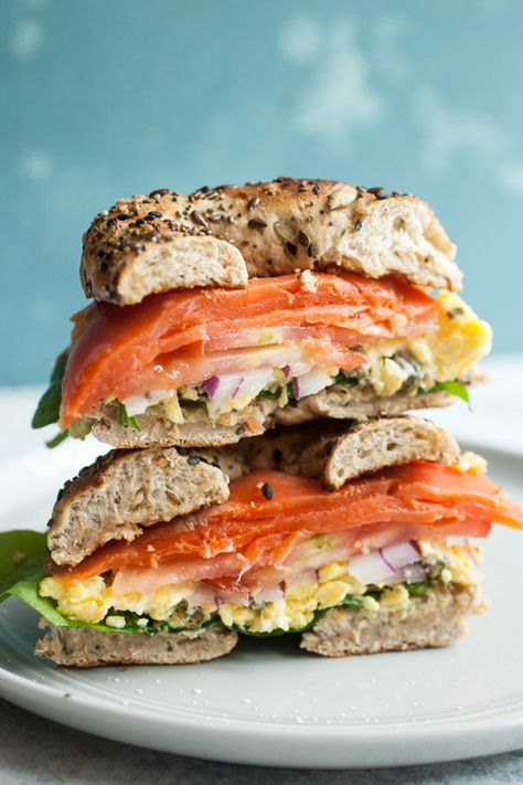 This hearty breakfast sandwich is easy to build and perfect for this time of year when tomatoes are at their best. Don't forget the caper scrambled eggs. They make the sandwich special! macheesmo.com #breakfast #easy #lox #sandwich #bagels Best Bagel Sandwich Recipe, Lox Sandwich, Breakfast Bagel Sandwich, Lox Breakfast, Bagel Lox, Bagel Sandwich Recipes, Lox Recipe, Lox Bagel, Bagel Breakfast