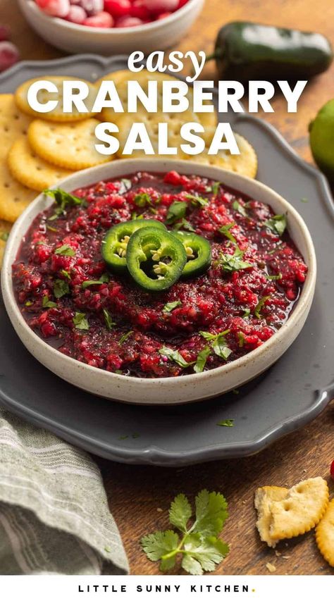 Fresh and spicy Cranberry Salsa is the best holiday appetizer, made with tart cranberries, spicy jalapenos, and just 5 other ingredients. Cranberries With Jalapeno, Cranberry Salsa Recipes Cilantro, Jalapeño Cranberry Salsa, Spicy Cranberry Salsa, Cranberry Jalepeno Recipes, Jalapeño Cranberry Sauce, Cranberry Jalapeno Salsa, Cranberry Salsa Recipes, Cranberry Salsa With Cream Cheese