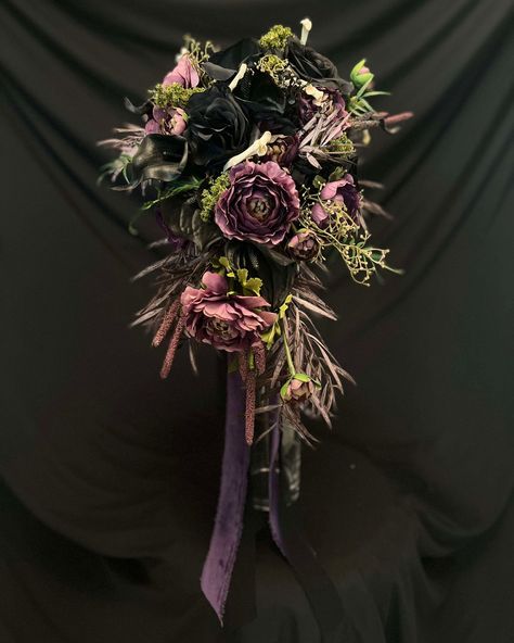 This Large Statement bouquet is Dark + Moody Cascading Wedding Bridal Bouquet Rainbow Moonstone Crystal Scepter Wand Handle Gothic Alternative Black, Deep Purple Roses Purple Flowers, Calla Lilies, Real Animal Bones, Black Ribbons, Purple Ribbons This bouquet is ready for your amazing Dark + Moody, Contemporary or Gothic wedding. It's our newest addition to our floral collection. http://Bouquets.Wedding for more styles and selections of pre-made bouquets and boutonnieres. We take orders fo... Moody Contemporary, Crystal Scepter, Dark Purple Wedding, Rainbow Moonstone Crystal, Roses Purple, Purple Bouquet, Bouquets Wedding, Animal Bones, Floral Collection