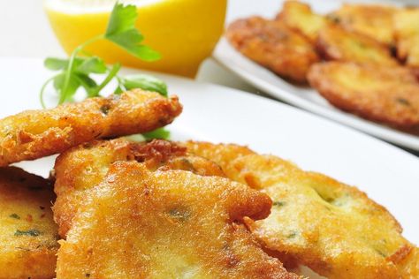 These fritters can be found in various versions throughout the islands and are called stamp-and-go in Jamaica, saltfish accra in Trinidad, and fish cakes in Barbados. They are a mixture of flour, codfish and spices deep fried as either flat cakes or round balls. They make a great appetizer. Get the recipe at http://tastetheislandstv.com/bacalaitos-cod-fritters/. #islands #foodie #paradise #nomnom #food #recipes #caribbeanfood #tastetheislands Codfish Fritters, Cornbread Waffles Recipe, Butter Fish Recipe, Cod Fritters, Cod Fish Cakes, Healthy Cornbread, Rellenos Recipe, Salted Cod, Pan Fried Fish