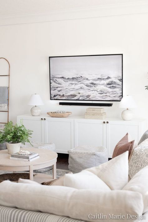 Simple TV Wall Decor (Living Room Update) - Caitlin Marie Design Tv Wall Farmhouse Decor, Coastal Tv Stand Decor, Tv Wall Modern Farmhouse, Tv Stand Styling Modern, Blanket Ladder Next To Tv, Smart Tv Wall Design, Wall With Tv Ideas, Modern Farmhouse Tv Wall, Tv Wall Farmhouse