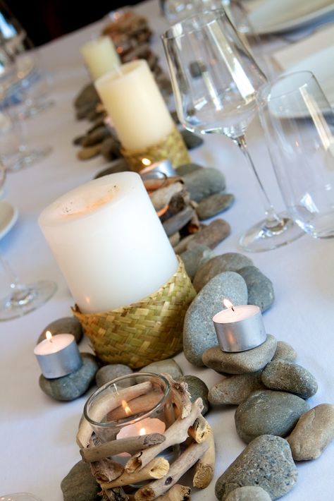 Rustic river: stones, tealights and flax weave detail on candles ...see more on www.facebook.com/tabledecorNZ Rocks Wedding Decor, Rock Table Decor, River Rock Centerpiece, Rock Centerpieces, Ladies Tea, Romantic Outdoor Wedding, Yacht Wedding, Retreat Ideas, Whiskey Tasting