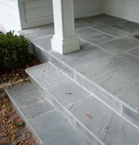 what about a lovely blue stone front stoop and the facade of the front stoop? Front Porch Stone, Stone Patio Designs, Veranda Design, Porch Stairs, Front Porch Steps, Front Stairs, Concrete Patio Makeover, Porch Tile, Concrete Patios