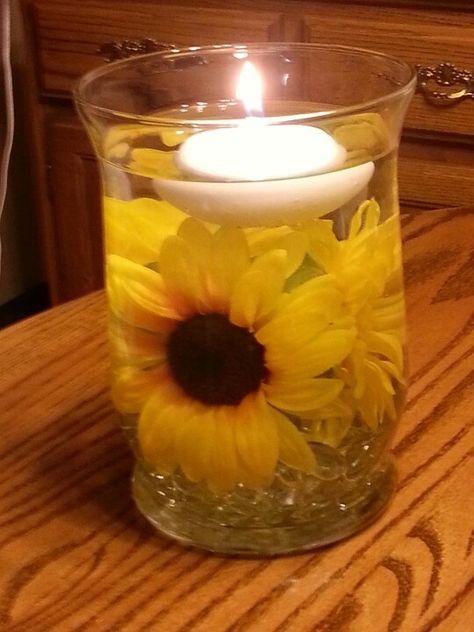 sunflower wedding centerpieces with candle | Sunflower centerpiece with candle! Romantic! Budget Setup, Sunflower Wedding Centerpieces, Centerpieces Simple, Ideas Candles, Centerpieces Candles, Sunflower Ideas, Diy Floating Candles, Cheap Wedding Centerpieces, Sunflower Centerpieces