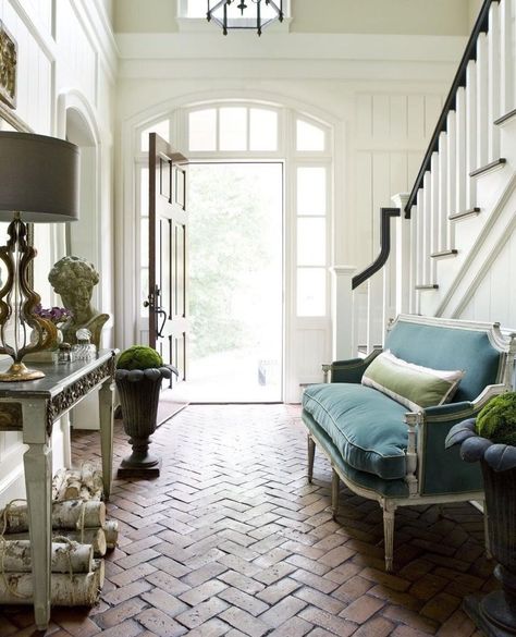 This herringbone brick-laid foyer isn't just beautiful, it's SMART. It can handle all incoming weather and critters, and just gets better… Southern Foyer, Herringbone Brick Floor, Traditional Entryway, Brick Floor, Foyer Staircase, Geek Decor, Foyer Decorating, Brick Flooring, Atlanta Homes