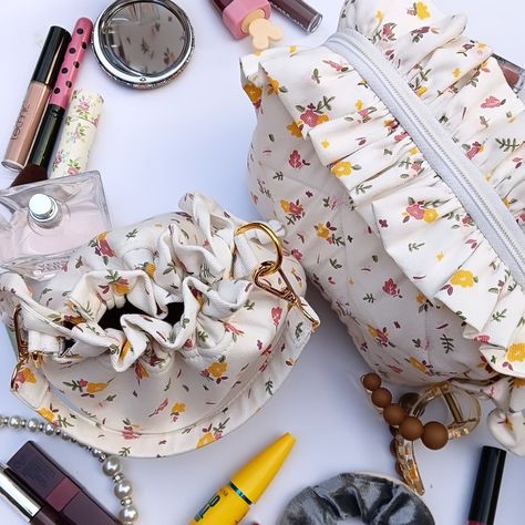 look at this pretty flower pouch and cute drawstring bag! 🌸 Perfect for organizing your essentials in style. Whether it's for travel, work, or everyday use, these handcrafted pieces combine elegance and utility seamlessly. 💼🎒 🛒 Shop now and add a touch of charm to your collection! #floralpouch #handmadebag #drawstringbag #multipurposepouch #stylishstorage #handcraftedaccessories #smallbusinesslove #floralprint #makeupbag #bagtalkies #pinterestfinds #cutepouch #aesthetic #dreambag #smallbusi... Unique Pouch, Makeup Pouches, Handmade Makeup, Handcrafted Bags, Pretty Flower, Travel Work, Handcrafted Accessories, Makeup Pouch, Stylish Storage