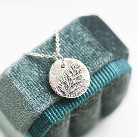 Charm necklace with fern leaf texture. I sculpted it from silver metal clay and then fired it to become fine silver. The pendant is about 14mm (1/2") in diameter. You can buy it with or without a dainty sterling silver chain. If you are buying it as a gift I would suggest a 16" (40cm) or 18" (45cm) chain. If you are unsure about the length, place a string around your neck and hold both ends by your chest where you want the pendant to sit, then measure the length of the string. You will receive i Grass Texture, Silver Metal Clay, Fern Leaf, Winter Jewelry, Metal Clay Jewelry, Leaf Texture, Inspired Necklace, Jewelry Workshop, Jewelry Making Project