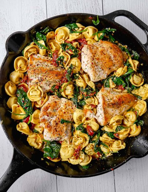 This Tuscan Chicken with Tortellini is the perfect quick weeknight meal for the family. With spinach, garlic, sundried tomatoes, and a delicious sauce to go with deliciously seared chicken. #chicken #protein #chickenrecipe Chicken With Tortellini, Summer Dinner Party Recipes, Easy Paella, Pan Seared Chicken Breast, Summer Dinner Party, Seared Chicken Breast, Chicken Tortellini, Tortellini Recipes, Pan Seared Chicken