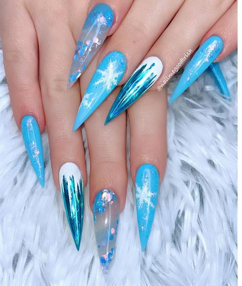 Jack Frost Nails, Ice Nails Designs, Icicle Nails, Blue Christmas Nails Stiletto, Iridescent Snowflake Nails, Blue Icicle Nails, Light Blue Winter Nails Snow Flake, Blue Sparkle Nails With Snowflake, Snowflake Nails