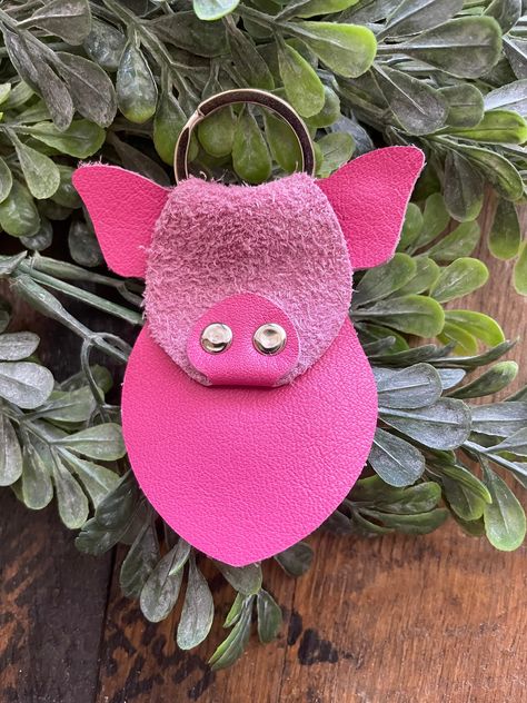 This keychain is handcrafted from genuine leather and measures approximately three inches long. Diy Leather Cow Keychain, Leather Keychain Ideas Handmade, Diy Leather Working, Leather Tutorial, Handmade Leather Jewelry, Diy Leather Earrings, Diy Leather Projects, Third Anniversary, Leather Craft Projects