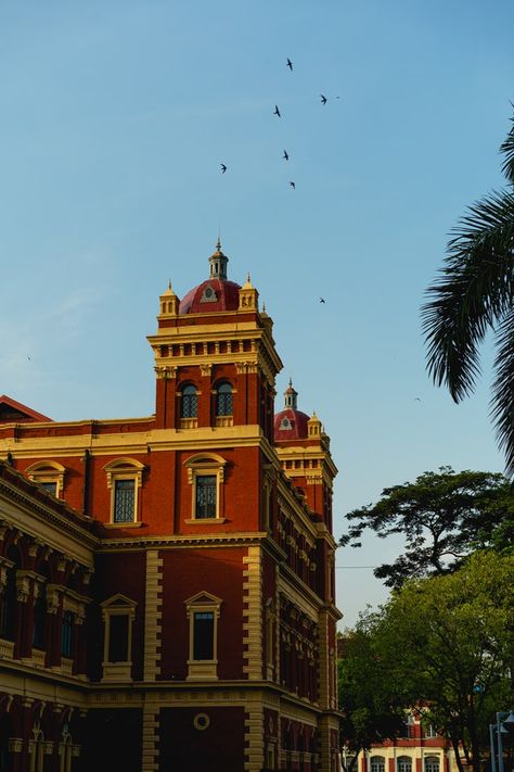 You can explore Yangon with a one, two or three-day itinerary and it's not hard to visit all of the best markets, temples, landmarks and sights to see, along with some of the best food and cafes. Yangon City Photography, Myanmar Architecture, Yangon City, Brutalism Poster, Europe Building, Ngapali Beach, Landscape Sketches, Study Reference, Beauty Land