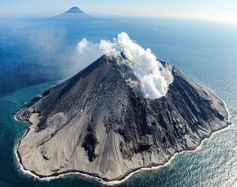 Raikoke is, as of 2019 an uninhabited volcanic island near the centre of the Kuril Islands chain in the Sea of Okhotsk in the northwest Pacific Ocean, 16 kilometres (9.9 mi) distant from the island of Matua. Its name is derived from the Ainu language, from “hellmouth”. Kuril Islands, Tumblr Travel, Volcanic Island, Bbc Earth, Ireland Vacation, Active Volcano, World Cities, Europe Travel Destinations, City Landscape