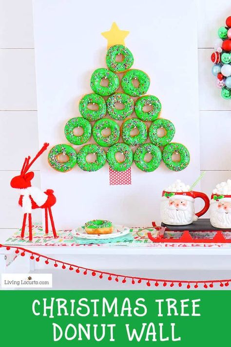 How to make a Christmas Tree Donut Wall. This simple Christmas party food craft will wow your guests making you and your adorable donut wall the hit of the season! Cute party dessert table idea, holiday decor and breakfast treat. #christmas #donuts Homemade Donut, Christmas Donuts, Holiday Desserts Table, Donut Decorations, Party Dessert Table, Dessert Table Decor, Donut Wall, Dessert Party, Homemade Donuts