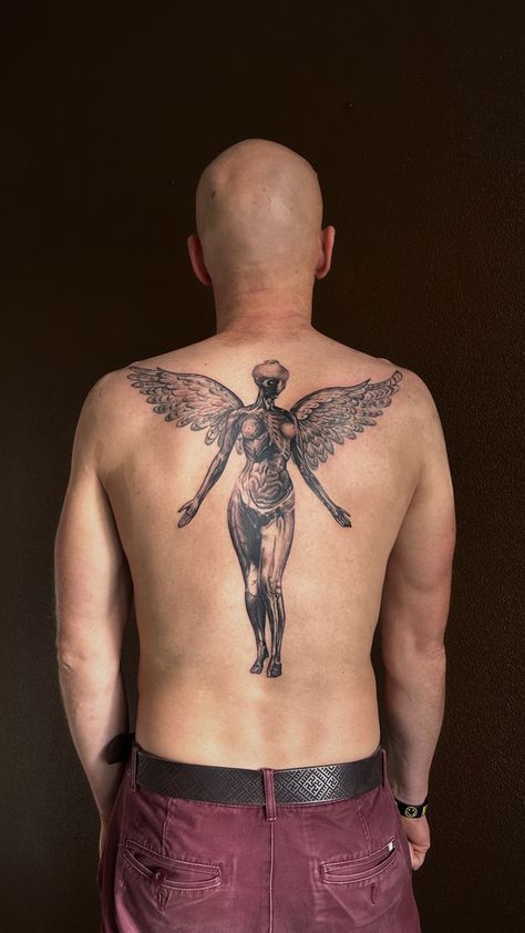 #tattoo #nirvana #nirvanatattoo #backtattooart #musictattooideas #ink #inked Nirvana Back Tattoo, Nirvana Angel Tattoo, In Utero Tattoo, Negative Tattoo, Angel Back Tattoo, Outlaw Tattoo, Nirvana Tattoo, Tattoo 2024, Piece Tattoo