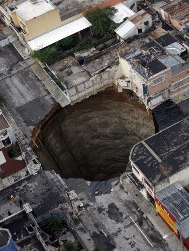 What causes a sinkhole? Hole In The Ground, Guatemala Travel, Guatemala City, Natural Phenomena, Alam Yang Indah, Science And Nature, Natural Disasters, Amazing Nature, Natural Wonders