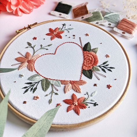 "Celebrate and share the love with Floral Heart, a hand embroidery kit by Tales from the Hoop.  A perfect DIY gift for a happy couple or a beautiful piece of creative wall art, this gorgeous kit combines warm pastel colours, intricate flowers and calming, grounding greenery and foliage with metallic copper flashes. This kit is designed to give you hours of enjoyment and an escape from the hustle and bustle of life. We are all about self-love as well as loving those special people in your life - Floral Heart Embroidery, Digital Embroidery Patterns, Hand Embroidery Kits, Heart Embroidery, Floral Embroidery Patterns, Contemporary Embroidery, Hand Embroidery Kit, Jean Crafts, Cadeau Diy