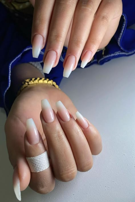 Elegant ballerina nails with a timeless French manicure design. The natural pink base pairs flawlessly with the crisp white tips, showcasing a sophisticated and classic look that never goes out of style. Perfect for any occasion that calls for a touch of refined simplicity.  // Photo Credit: Instagram @thenailcure_ Almond Vs Ballerina Nails, French Manicure Ballerina Nails, Summer Ballerina Nails, Trendy Ballerina Nails, Ballerina French Tip Nails, French Nails Ballerina, Ballerina Nail Designs, Ballerina Nails Long, French Ballerina Nails