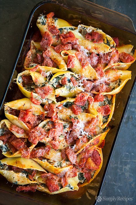 Jumbo pasta shells stuffed with Italian sausage, spinach, ricotta and Parmesan cheeses, covered with cooked tomatoes and baked. ~ SimplyRecipes.com Pasta Shells Recipe, Italian Sausage Spinach, Cooked Tomatoes, Pasta Shells Stuffed, Jumbo Shells, Shells Stuffed, Shell Pasta Recipes, Sausage Spinach, Jumbo Pasta Shells