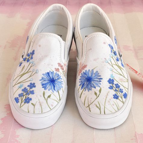 Hand painted Vans Classic slip ons, with embroidered details. A bride-to-be asked me to paint these in her wedding color palette, and I'm so grateful that she did 😊🙏 People usually ask me to paint most of the available area - these are more minimal, with a clean look. I love how they turned out 😍. What do you prefer? A mostly minimal aesthetic, or a fuller maximalist one? Let me know in the comments 🌸 #customsneakers #weddingsneakers #somethingblue #customvans #handpaintedshoes #paintedvans Painting White Shoes Ideas, Easy Shoe Painting Ideas, Hand Painted Vans, Wedding Vans, Vans Classic Slip, Painted Vans, Wedding Sneakers, Hand Painted Shoes, Minimal Aesthetic