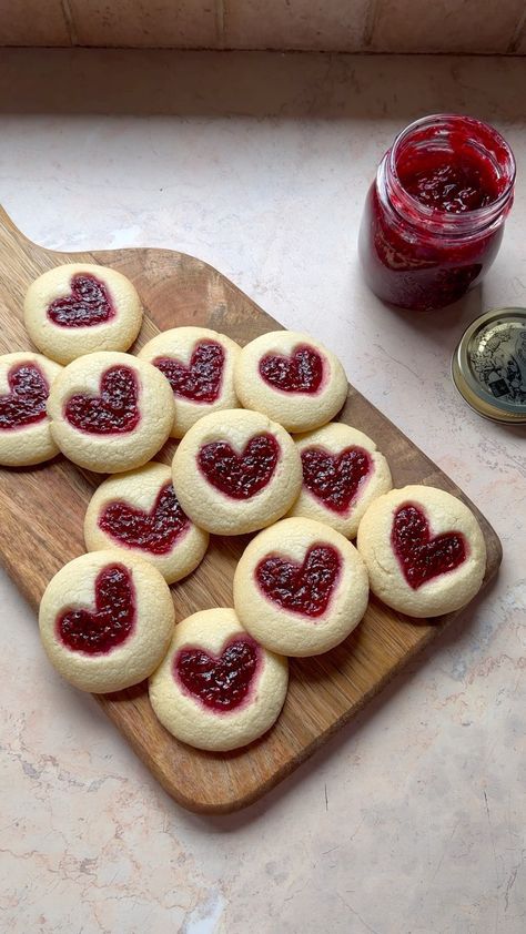 Heart thumbprint cookies 💖 Written recipe and measurements are on the link on my profile 💌 Ingredients: 115g unsalted butter (room… | Instagram Thumbprint Cookies Aesthetic, Thumbprint Cookies Heart, Heart Thumbprint Cookies, Heart Thumbprint, Heart Cookies Recipe, Aesthetic Dessert, Seasonal Baking, Finger Cookies, Jelly Cookies