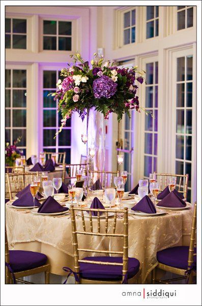 Unique Table Numbers Wedding, Purple Wedding Centerpieces, Purple Centerpieces, Purple And Gold Wedding, Gold Wedding Colors, Purple Table, Purple Wedding Theme, Wedding Colors Purple, Tropical Wedding Flowers