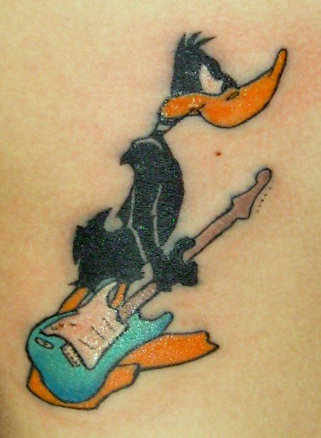 Daffy duck tattoo Daffy Duck Tattoo, Moose Tattoo, Duck Tattoos, Hunting Tattoos, Deer Tattoo, Buck And Doe, Duck Head, Hunting Women, Head Tattoos