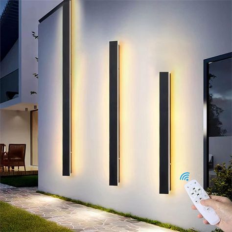 Illuminate your garden with the enchanting glow of our LED garden lights! 🌼✨ Create a magical outdoor oasis that comes to life after dark. Perfect for cozy evenings, garden parties, or simply adding a touch of charm to your landscape. Light up your nights with style! 💫🏡 #GardenLights #OutdoorDecor #LEDLighting #NighttimeMagic Lighting Your Garden, Modern Outdoor Wall Lighting, Stripped Wall, Balcony Lighting, Long Walls, Yard Lights, Backyard Lighting, Luminaire Mural, Outdoor Patio Lights