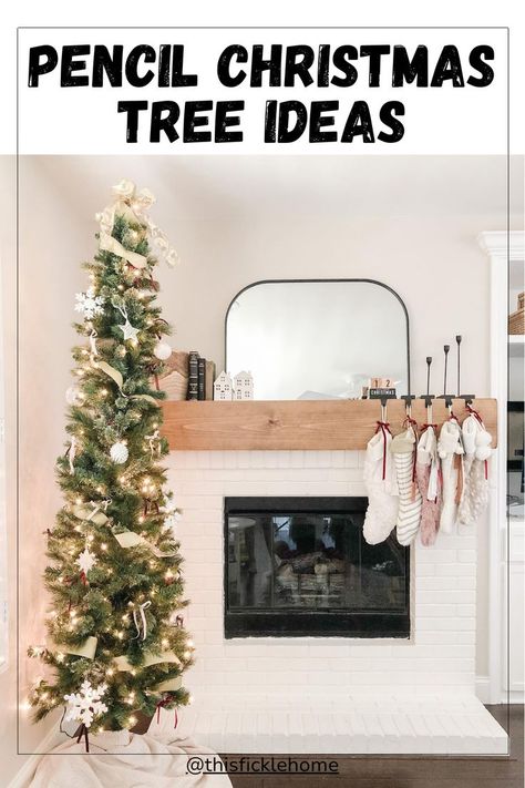 Pencil Christmas Tree Ideas Simple Christmas Tree Ideas Decoration, Christmas Trees Next To Fireplace, Neutral Pencil Christmas Tree, Christmas Tree Placement In Living Room Small, Christmas Tree For Small Living Room, Simply Decorated Christmas Trees, Pencil Trees Christmas, Under Christmas Tree Ideas, Pencil Xmas Tree Decorating Ideas