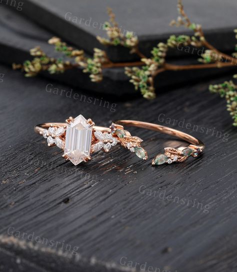 Long hexagon Moissanite Engagement ring Set Vintage moss agate engagement ring Rose gold Cluster shank marquise cut leaf Bridal set promise ABOUT THIS RING Beautiful Moissanite engagement ring set -------------------------------------------------------- 「Product Summary」 Engagement Ring * Center Stone: 5*10mm moissanite  or Simulated  Diamond (hexagon cut) * Side Stones: 1.5*3mm Marquise cut Moissanite                           1.7mm Round Moissanite Or Side Stone: Simulated Diamond * Total Cara Moss Agate Engagement Ring, Moissanite Engagement Ring Set, Cute Engagement Rings, Agate Engagement Ring, Engagement Ring Rose Gold, Custom Wedding Rings, Full Eternity Ring, Ring Rose Gold, Engagement Ring Set