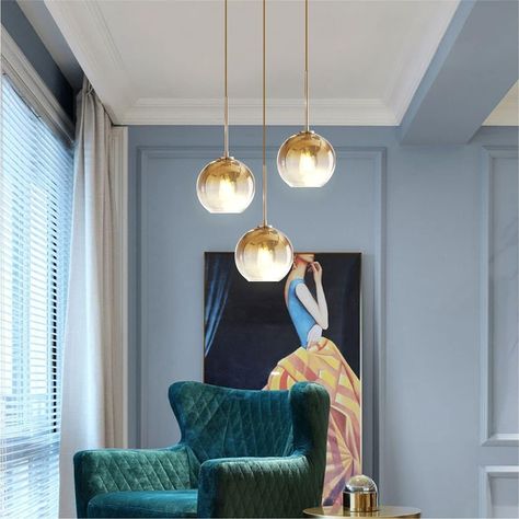 1.【Adjustable heights 】: This gold ceiling pendant light fixture comes with 150cm wire.You can freely adjust the height of the hanging lamp. 2.【Suitable size】: Material:Metal.Glass, the diameter of canopy: 13.8”(35cm) , Max height:59.1”,width:9.8”,Globe size：5.9”+7.89”+9.85”.voltage:110-250V for Worldwide(Not dimmable); Light source: E26 *3( Bulb not included). 3.【Exquisite Glass】: The High-quality glass shades are made of high-quality materials, so that the shades have a natural beauty, soft light transmission, charming yellow light when lighting, and create a warm home atmosphere. 4.【Unique lampshade】: Gold gradient spherical glass is more attractive than ordinary glass. The best choice for our ceiling pendant interior decoration. The chandeliers hanging in the century will definitely ad Large Glass Pendant Light, Glass Pendant Lights Kitchen, Pendant Lights Kitchen Island, Chandelier Mid Century, Large Glass Pendant, Lights Kitchen Island, Glass Pendant Lighting Kitchen, Light Cluster Pendant, Cluster Pendant Light