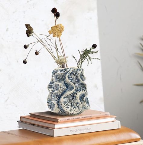 This modern stoneware vase features an organic, nature-inspired silhouette Display in a living space of any style from coastal to modern Fill with dried seasonal flora, decorative branches, or simply display as a standalone accent Made from stoneware 6.75 inches L x 6.75 inches W x 7.5 inches H Salted Granola, Ivory Color Scheme, Mantel Mirrors, Long Lumbar Pillow, Ceramic Ideas, Reactive Glaze, Outdoor Furniture Collections, Stoneware Vase, Decorative Pots